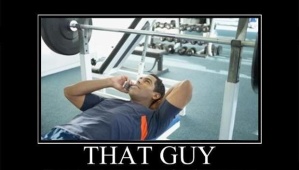 guy-on-cell-phone-at-the-gym